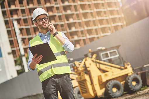 Building Contractor License in Florida Engineer On The Phone With Florida Contractors Licensing Firm Who Will Help Him Acquire Building Contractors License