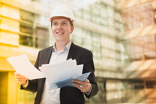 Change of Status and Transfer Florida Contractor Florida Contractor Happily Holding Papers Stating Transfer and Change of Status Has Been Approved