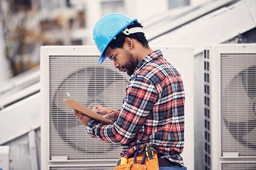 Florida Engineer with Class A HVAC Contractors License Reading Some Documents
