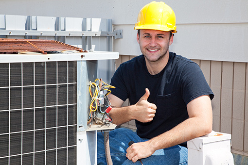 Contractor With Class B HVAC License Giving a Thumbs Up After Fixing Refrigeration Unit in Florida