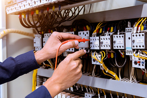 Electrician Working in a Residential Property in Florida After Obtaining His Electrical Contractor License