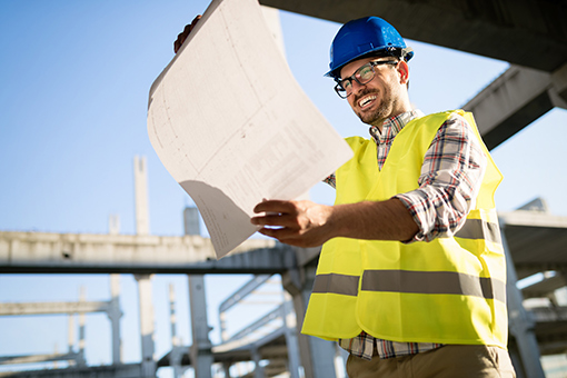 Florida Engineer Who Just Received General Contractor License Happily Looking At His First Ever Project Plan