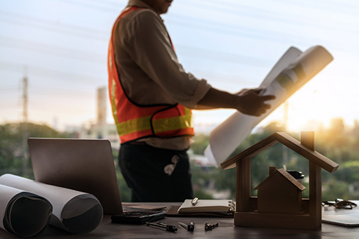Residential Contractor License Florida Florida Engineer Studying Industrial Plan for His First Project After Getting Residential Contractors License