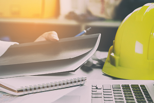 Helmet and Documents of Engineer Applying For Swimming Pool Contractors License in Florida