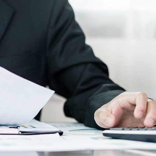 Florida Contractor Business Services Annual Reports Man Preparing an Annual Report For Florida Contractor Who Availed His Business Services