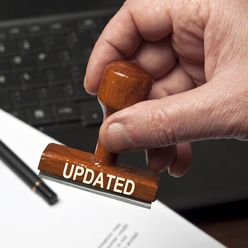 Man Stamping Document of Florida Contractor Who Availed Licensing Services for Change of Status